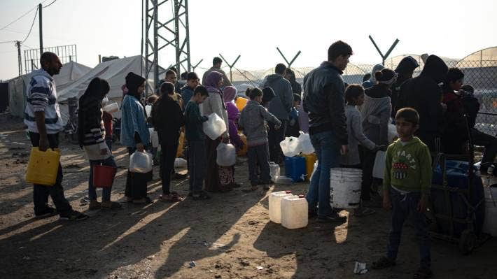 Families in Gaza search desperately for food and water, wait in long lines for aid