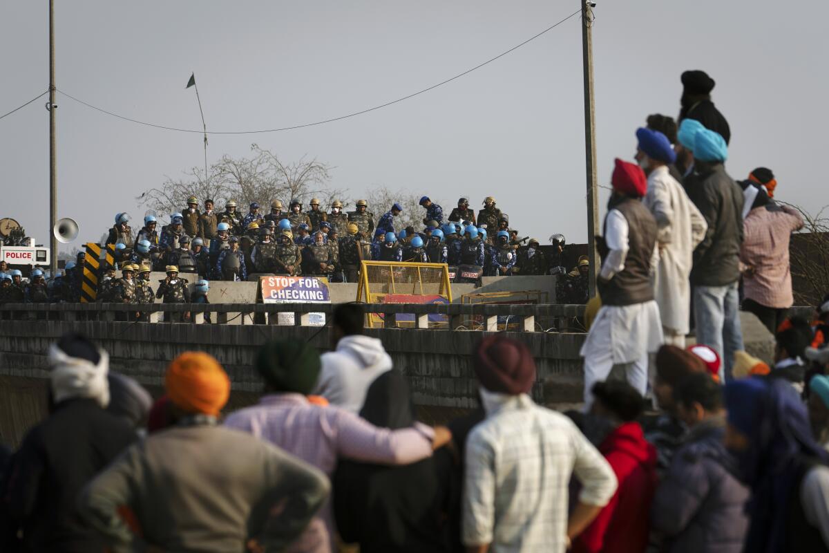 Indian farmers reject government offer and say they will carry on marching to New Delhi