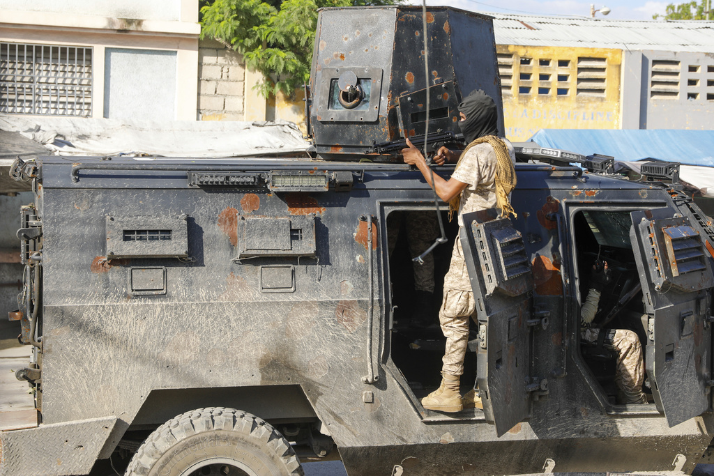 Haitian police spokesman says new gang attacks overwhelmed officers: 'The city center was at war'