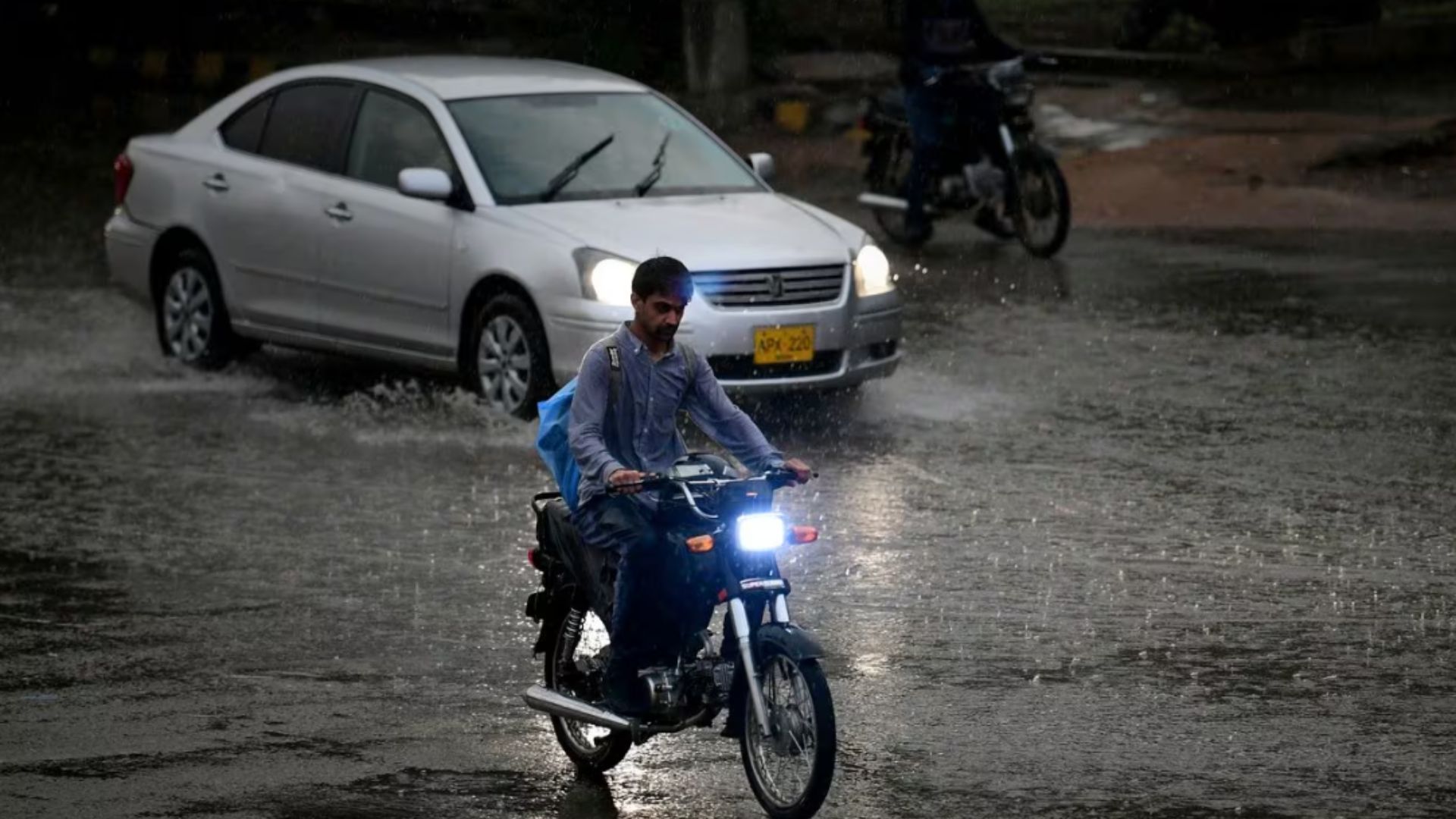 Heavy winter rains in Pakistan kill at least 29 as buildings collapse and landslides block roads