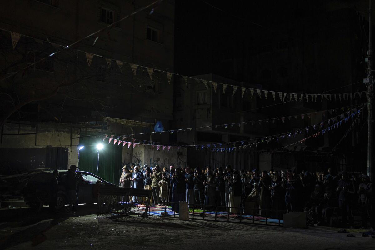 Palestinians in Gaza begin Ramadan with hunger worsening and no end in sight to the Israel-Hamas war 