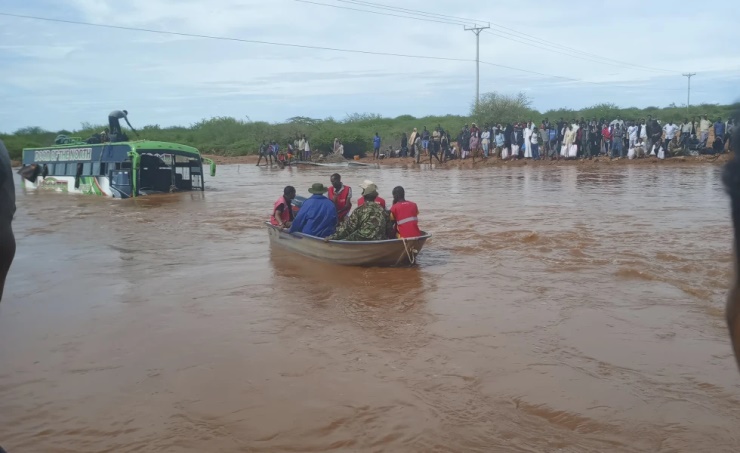 At least 13 people are killed and an estimated 15,000 displaced by flooding in Kenya