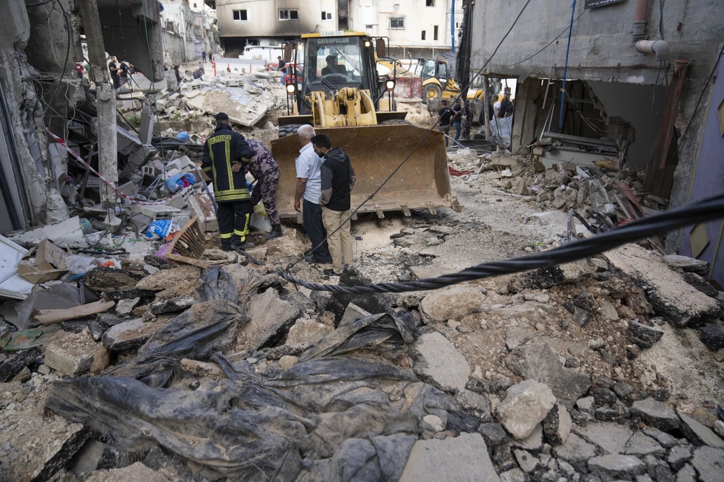 Israeli strikes on southern Gaza city of Rafah kill 22, mostly children, as US advances aid package