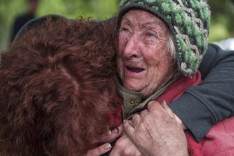 Russia says it has captured 5 villages in northeast Ukraine as more than 1,700 civilians flee