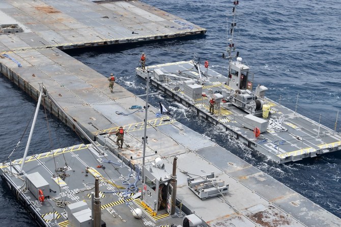 US military says Gaza Strip pier project is completed, aid to soon flow as Israel-Hamas war rages on