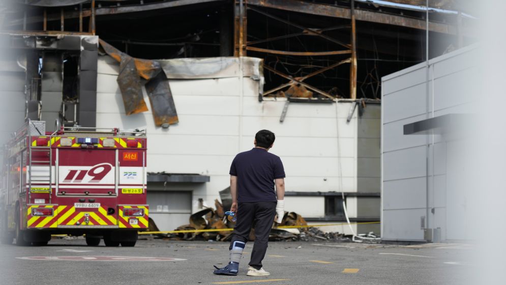 South Korean rescuers search burned factory after blaze killed 22, mostly Chinese migrants