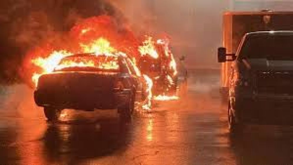 No police at sight, rows of burnt vehicles in front of charred police stations