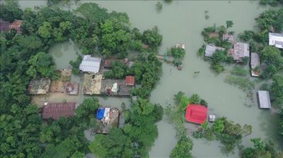 What caused the sudden devastating flood in Bangladesh?