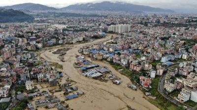 Death toll in Nepal flooding and landslides reaches at least 100, with dozens still missing