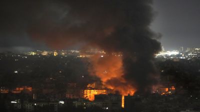 Israeli strikes on Gaza kill 22, officials say, as truck ramming near Tel Aviv hurts dozens